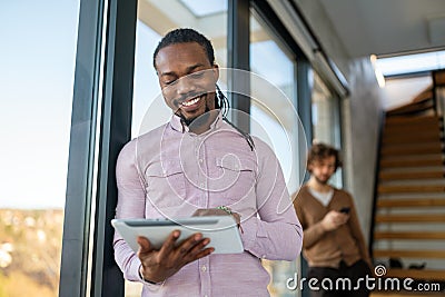 Happy software developer man working on project. Programming advanced code artificial intelligence Stock Photo