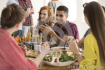 Happy spanish man eating lunch Stock Photo