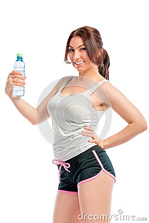 Happy sportswoman with a bottle of water Stock Photo