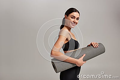 happy sportswoman in crop top and Stock Photo