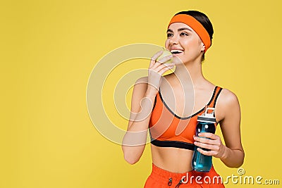 happy sportswoman with fresh apple and Stock Photo