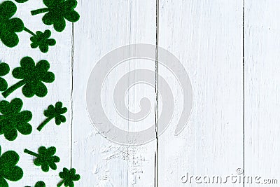 Happy St Patricks Day message and a lot of green paper clover Stock Photo