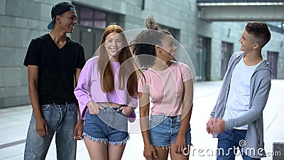 Happy stylish teenagers outdoors, adolescence positivity, cheerful young people Stock Photo