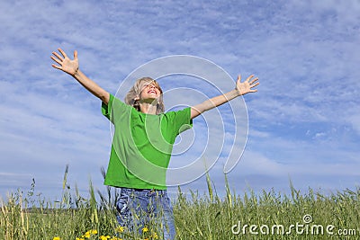 Happy summer child arms outstretched Stock Photo