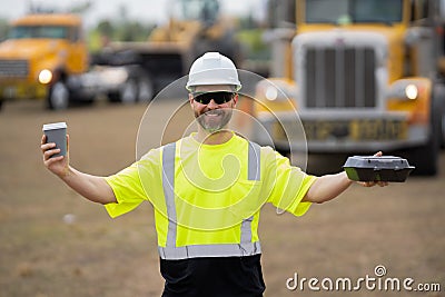 happy supervisor at the construction. supervisor man at construction site. worker at lunch break. male supervisor at Stock Photo