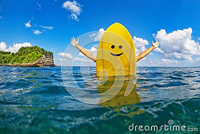 Happy surfer girl sit on yellow surfboard with smiley face Stock Photo