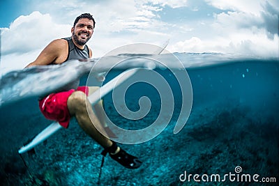 Happy surfer waits the wave on line up Stock Photo