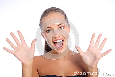 Happy surprise for teen girl with beautiful smile Stock Photo