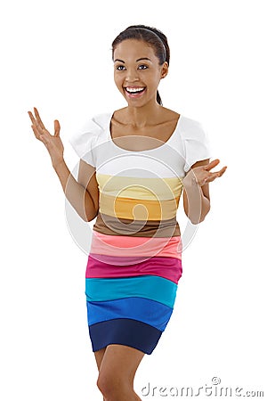 Happy surprised girl in multicolour dress Stock Photo