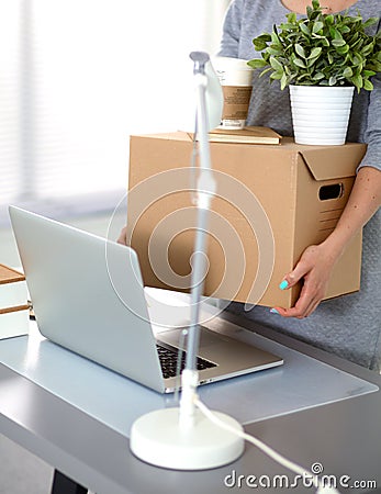 Happy team of businesspeople moving office Stock Photo