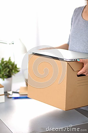 Happy team of businesspeople moving office Stock Photo