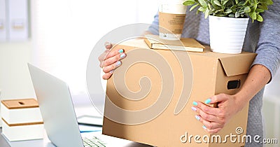 Happy team of businesspeople moving office, packing boxes, smiling Stock Photo