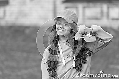 happy teen child skater with skateboard outdoor. girl with penny board. hipster girl with longboard Stock Photo