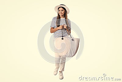 happy teen girl in marine style isolated on white. teen girl in marine style at studio. Stock Photo