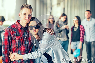 Happy teen girls and boys having good fun time outdoors. Stock Photo