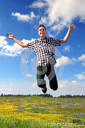 Happy Teenage Boy Jumping Stock Photo