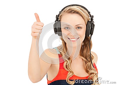 Happy teenage girl in big headphones Stock Photo