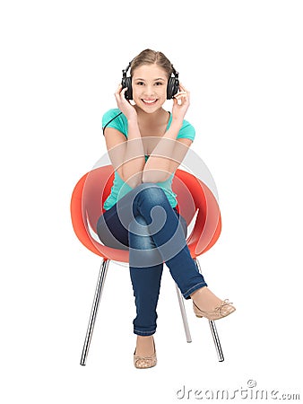 Happy teenage girl in big headphones Stock Photo