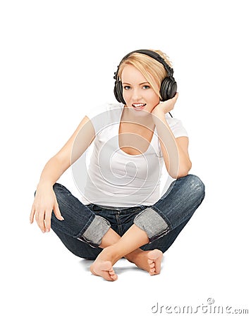 happy teenage girl in big headphones Stock Photo