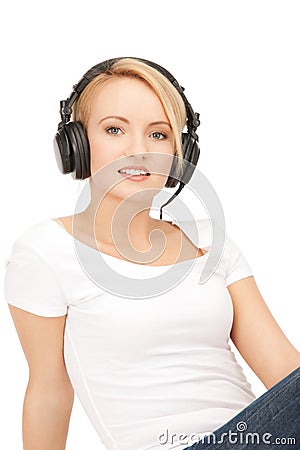 happy teenage girl in big headphones Stock Photo