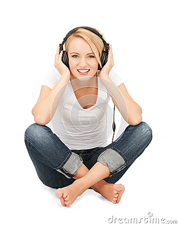 happy teenage girl in big headphones Stock Photo