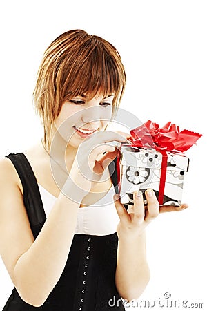 Happy teenage girl with gift box Stock Photo