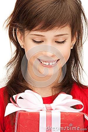 Happy teenage girl with gift box Stock Photo