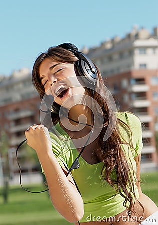 Happy teenage girl in headphones Stock Photo