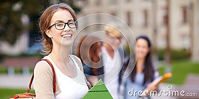 Happy teenage students with school folders Stock Photo