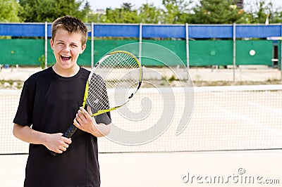 Happy teenage tennis player Stock Photo