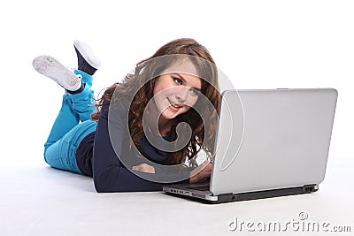 Happy teenager high school girl on internet Stock Photo