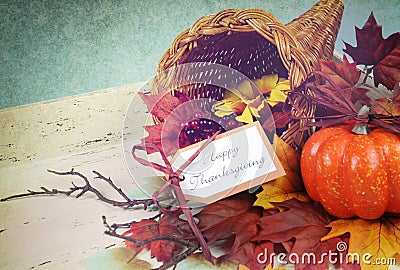 Happy Thanksgiving cornucopia with Autumn Fall leaves Stock Photo