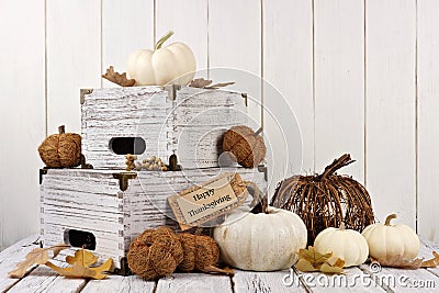 Happy Thanksgiving tag with decor against white wood Stock Photo