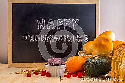 Happy Thanksgiving word cloud on a vintage slate blackboard. Stock Photo