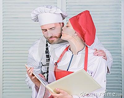 Happy to be in love. couple in love with perfect food. man and woman chef in restaurant. Menu planning. culinary cuisine Stock Photo