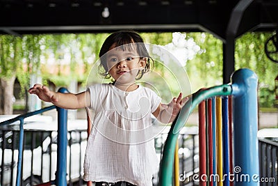 happy toddler on the playground Stock Photo