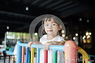 happy toddler on the playground Stock Photo