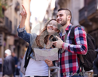 Happy tourists on excursion Stock Photo