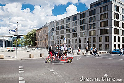 Happy tourists ride a velomobile Editorial Stock Photo