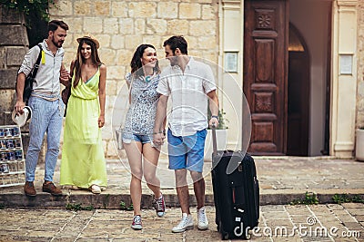 Happy tourists sightseeing in city Stock Photo