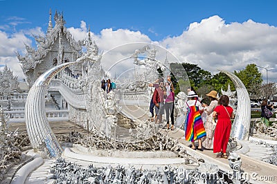 Happy tourists at the White Temple. Chiang Rai Editorial Stock Photo