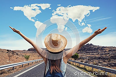 Happy travel woman on vacation concept with world shaped clouds. Funny traveler enjoy her trip and ready to adventure. Stock Photo