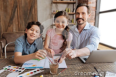 Happy united family cleaning brushes Stock Photo