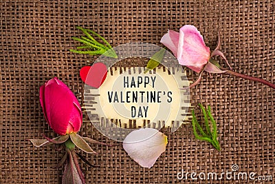 Happy valentine`s day written in hole on the burlap Stock Photo