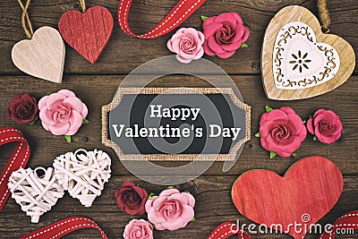 Happy Valentines Day chalkboard tag with frame of hearts and flowers Stock Photo