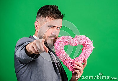 Happy valentines day. Hipster hold heart symbol love. Bring love to family holiday. Romantic surprise. Man in love Stock Photo