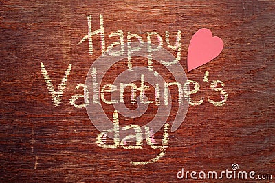 Happy Valentines day note on wood background Stock Photo