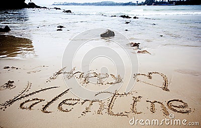 Happy Valentines day! written in sand Stock Photo