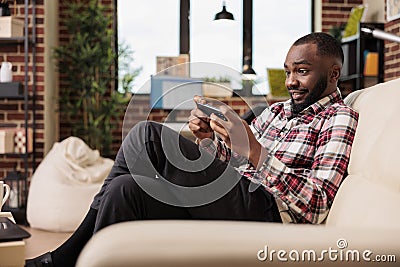 Happy virtual gamer having fun with video games Stock Photo