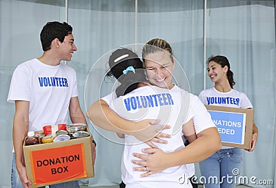 Happy volunteer group with food donation Stock Photo